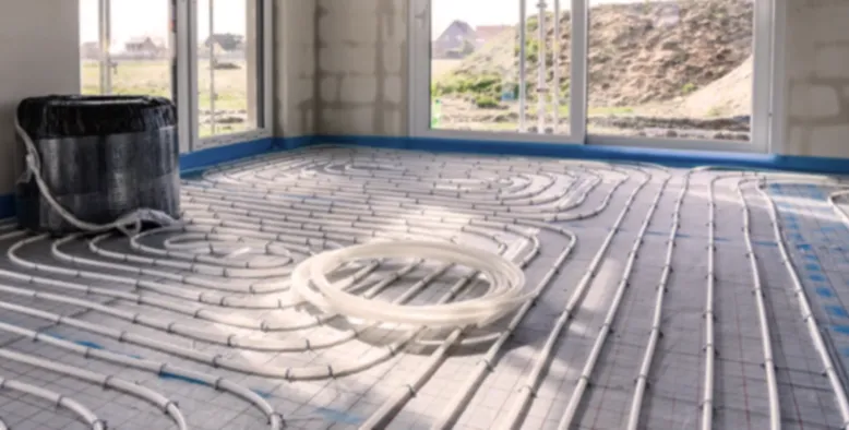 Instalación de suelo radiante con aerotermia en una vivienda de León